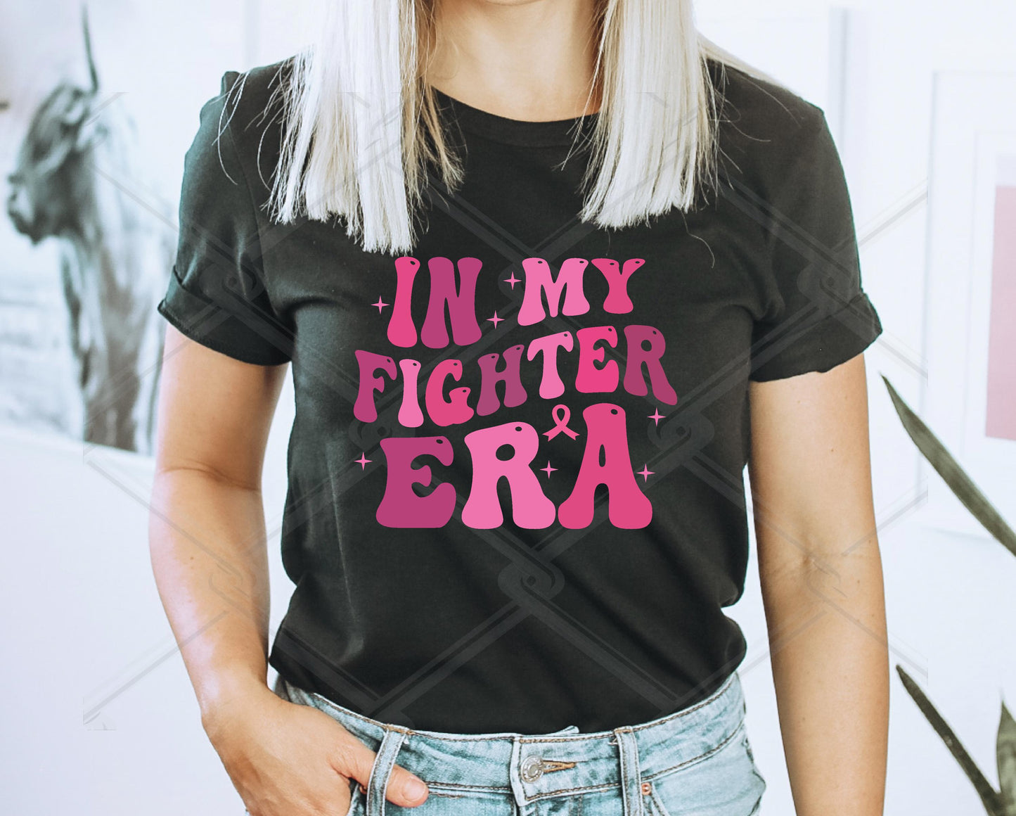 In my fighter Era Cancer Awareness t-shirt.